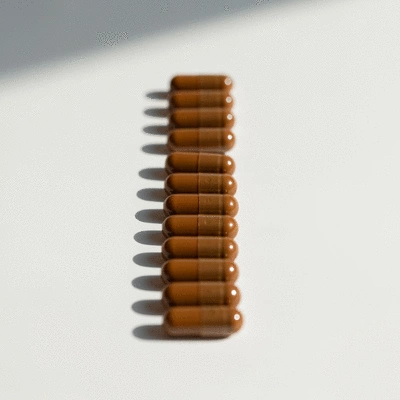 African Mango supplement capsules on a clean white background, no text, no words, no typography, 8K